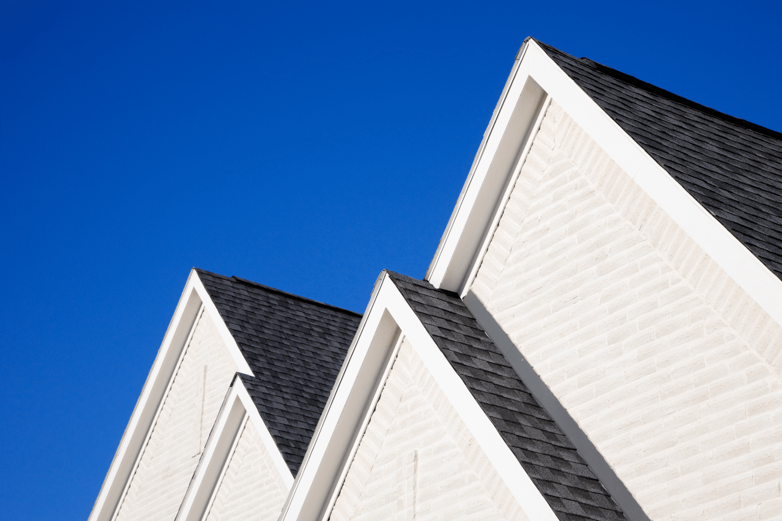 Bright residential home with a new roof by Timberman Roofing in Pensacola, FL